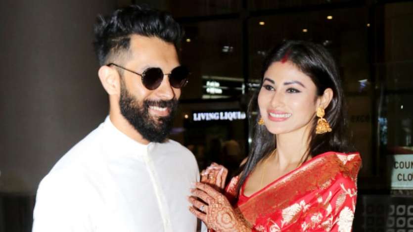 Image of Suraj Nambiar and Mouni Roy